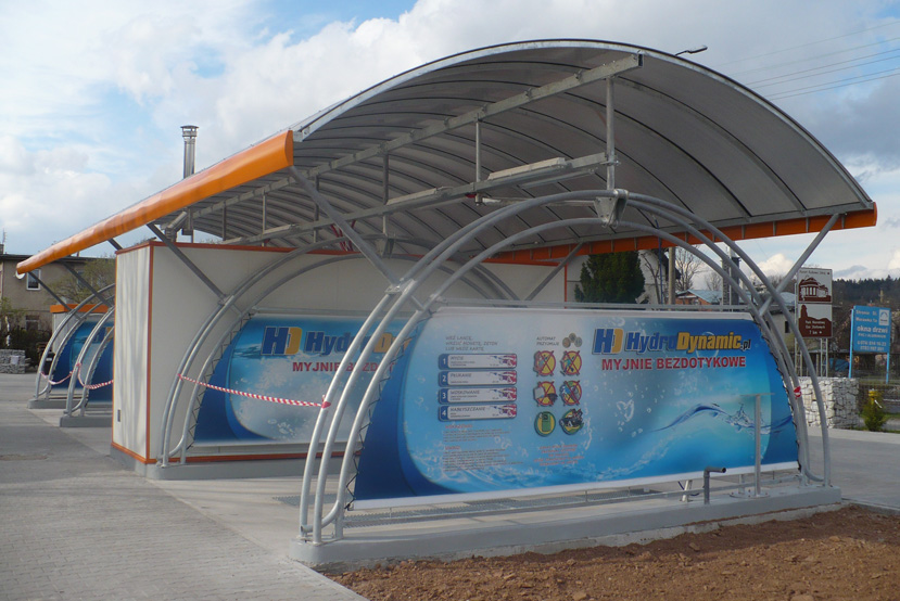 circular canopy of a touchless car wash