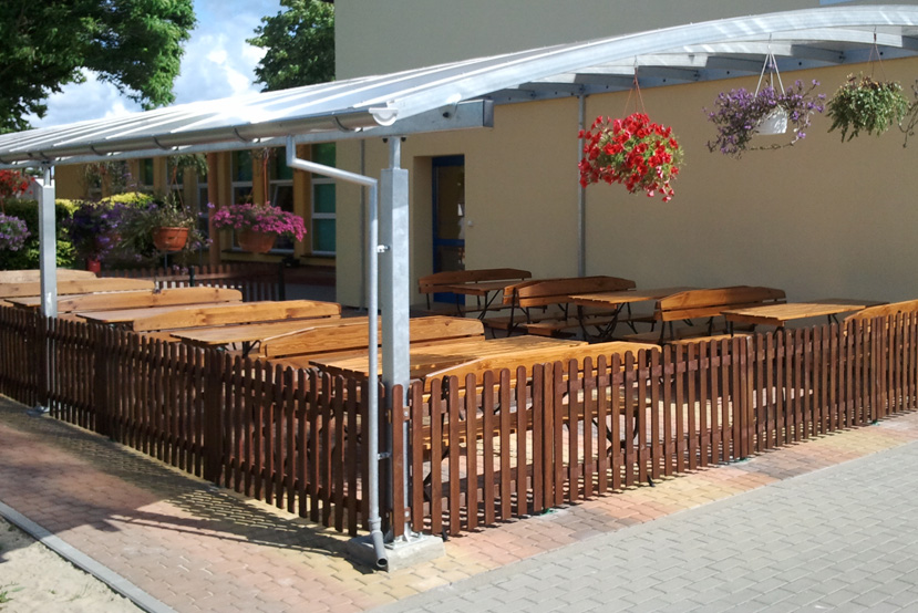 Large roof covering outdoor benches