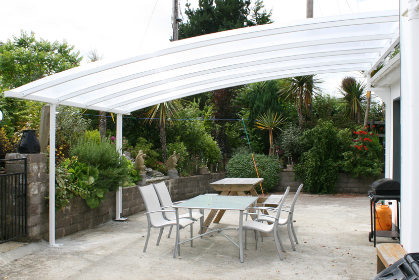 White roof covering a table with chairs